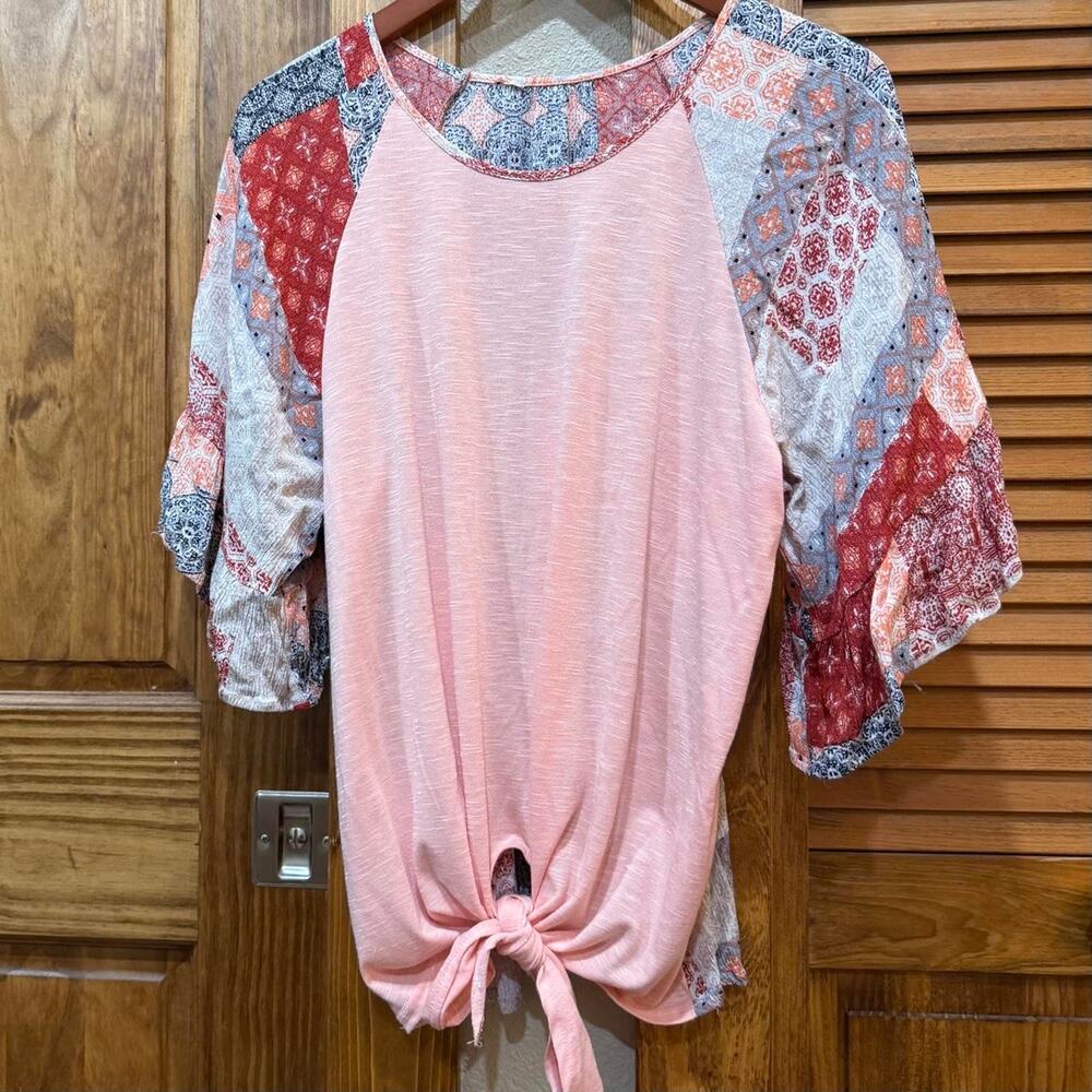 Pink blouse with patchwork sleeves